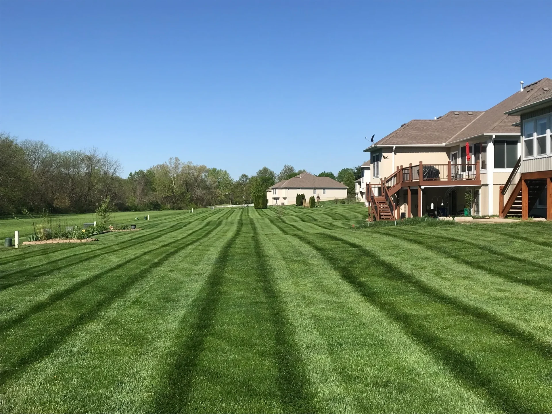 A large lawn with many lines in the middle of it
